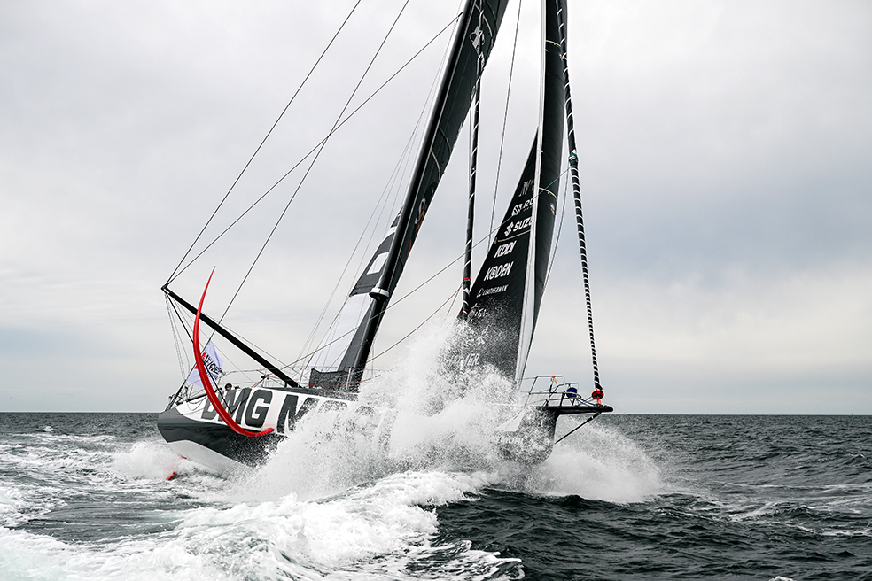 Japanese skipper Kojiro Shiraishi cuts through the waves in DMG MORI Global One racing towards Les Sables d’Olonne in the New York Vendee © photo by Jean-Louis Carli / Alea